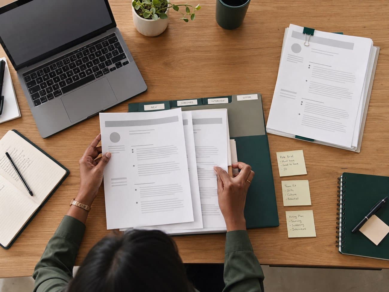 A recruiter organizing candidate profiles into a structured workflow